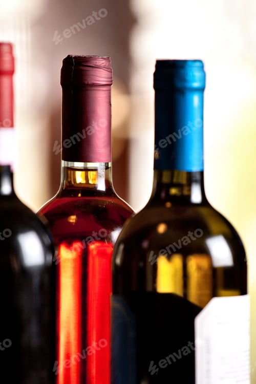 Preview: Wine bottles on a table.