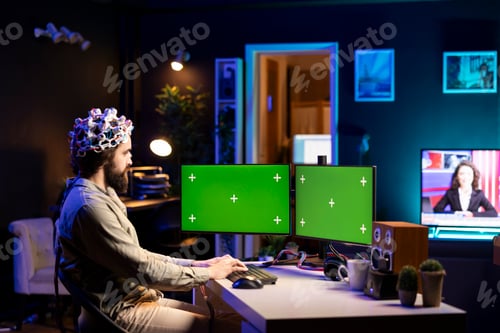 Preview: IT expert using high tech neuroscientific gear and mockup desktop PC