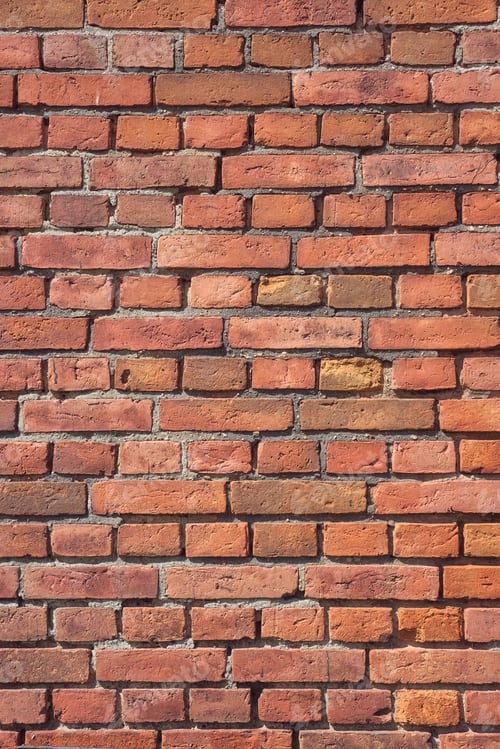 Preview: Photo of an old weathered brick wall, background or texture.