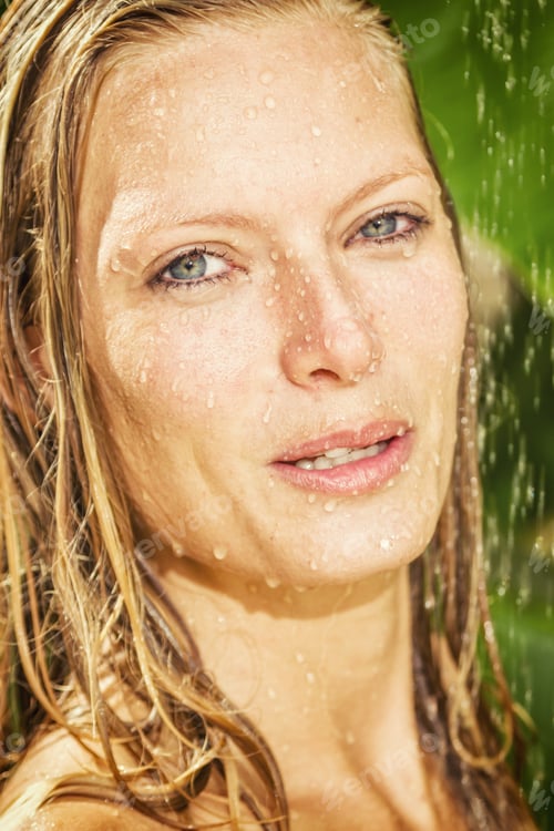 Preview: woman in tropical shower