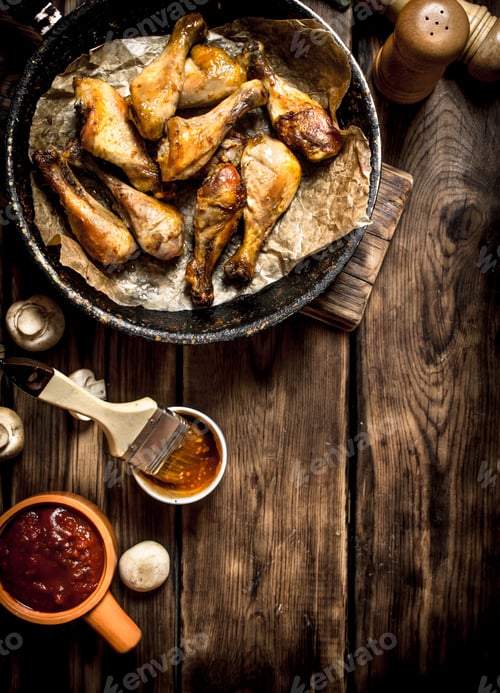 Preview: Fried chicken legs with tomato sauce.