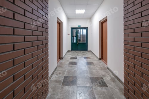 Preview: white empty long corridor with red brick walls for room office in interior of modern apartments