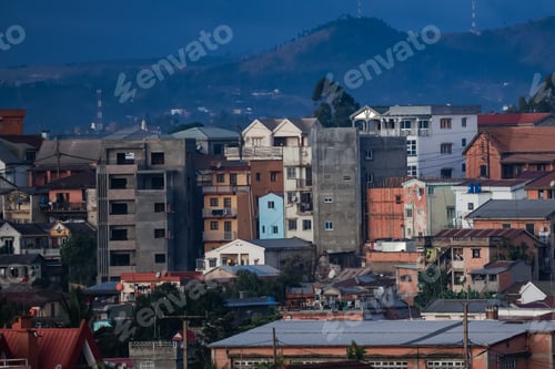 Preview: Authentic houses of Antananarivo showcasing diverse architecture against the backdrop of hills