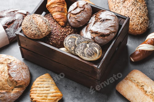 Preview: A basket full of delicious fresh bread on wooden background