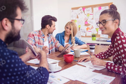 Preview: Group of young people working in the office