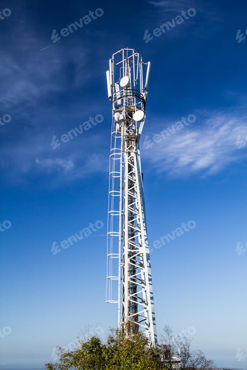 Preview: Mast is to accommodate cellular antennas on blue sky background