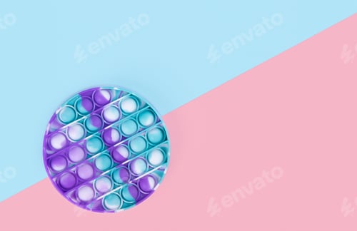 Preview: Pastel color round popit toy antistress for children and adults on a bicolor background