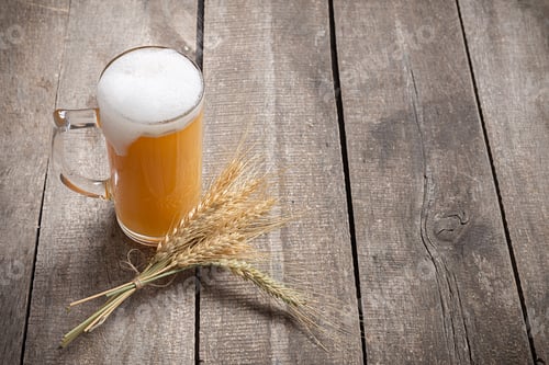 Preview: glass beer on wood background