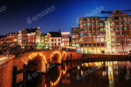 Preview: Canal in Amsterdam at night. Highlighting buildings and streets