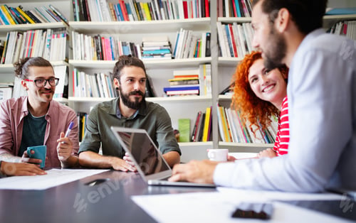 Preview: Working together on project. Happy young business colleagues working in office