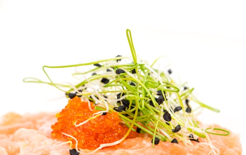 Preview: Salmon tartare with sprouts and red caviar.