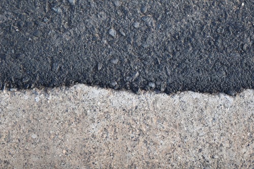 Preview: Asphalt street road beside concrete footpath texture background.