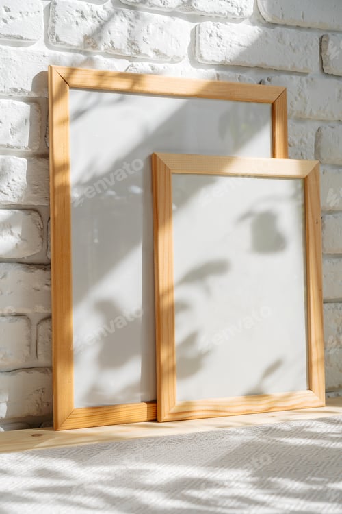 Preview: Photo frames on floor over white brick wall