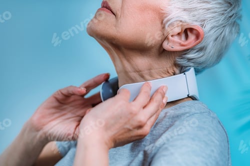 Preview: Neck massager. Senior Woman Getting a Neck Massage with Massager.