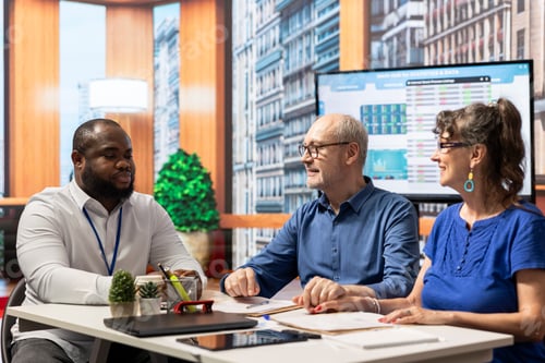 Preview: Mature couple consulting a financial planner about their retirement strategy