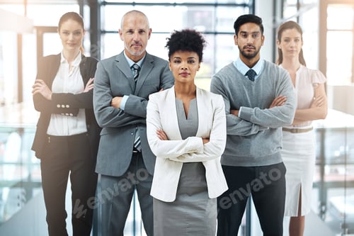 Preview: Portrait of a focused group of colleagues standing together in a modern office