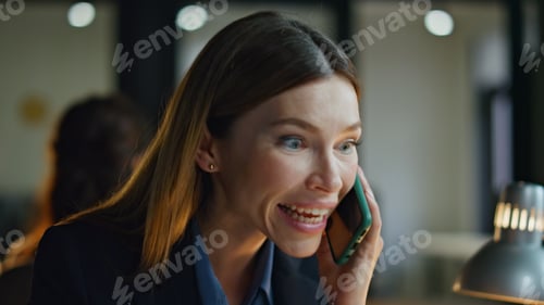 Preview: Joyful manager speaking mobile phone closeup. Happy businesswoman enjoy victory
