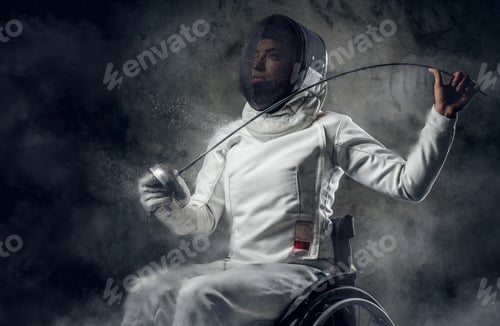 Preview: Female paralympic wheelchair fencer.