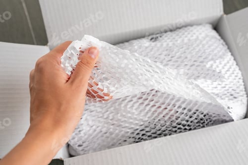 Preview: Corrugated white paper for safe transportation, in which the goods brought by the courier delivery