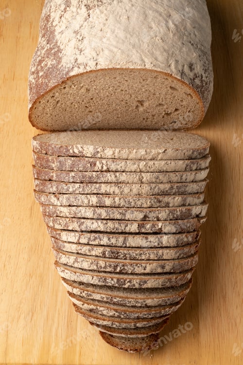 Preview: Traditional German sourdough bread and slices on a cutting board