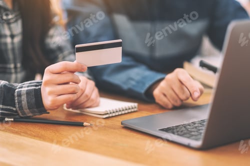 Preview: Businessman using credit card for purchasing and shopping online