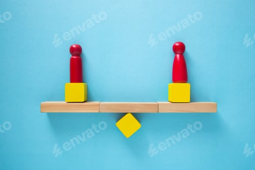 Preview: Conceptual image of balance and equality, represented by two red figures balancing on wooden seesaw