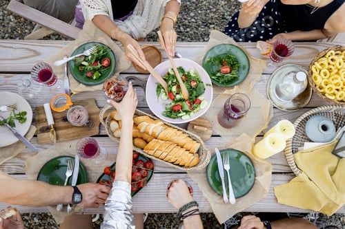 Preview: Dining table with food outdooors