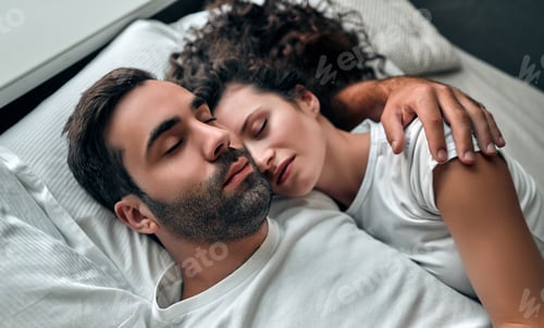 Preview: Young couple in bed
