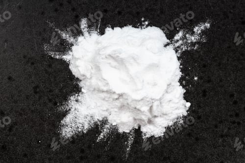 Preview: top view of pile of potato starch closeup on black