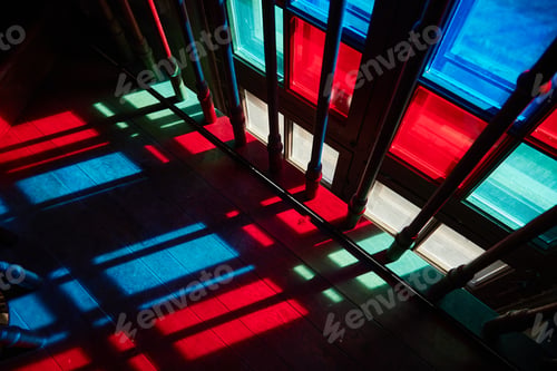 Preview: Colorful Sunlight Casting Vibrant Patterns through Stained Glass Windows