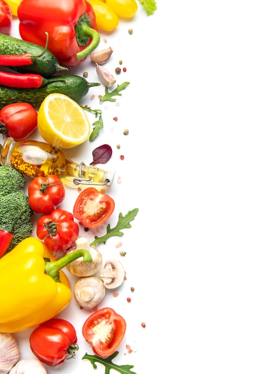 Preview: Fresh organic vegetables and spices bordering white background