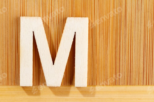 Preview: Letter M of wood-made alphabet, top view and space for text