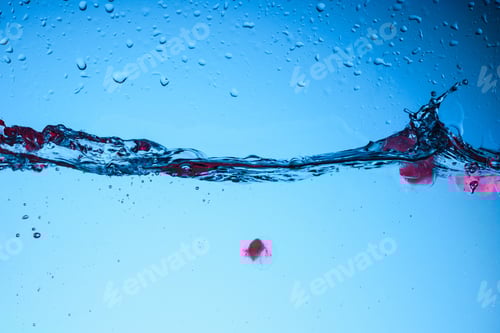 Preview: Red Cubes Dropping into Water with Splashes