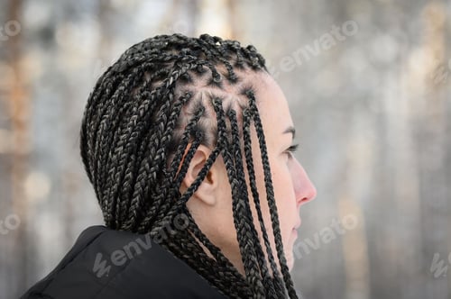 Preview: Young woman with African braids