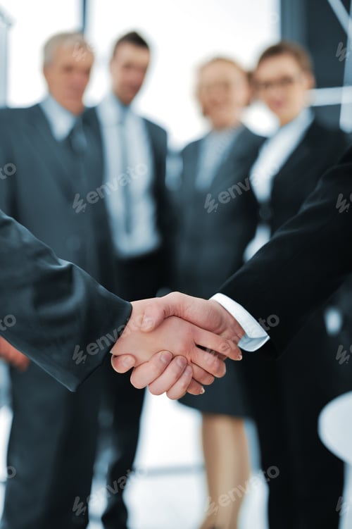 Preview: Handshake Isolated On Business Background
