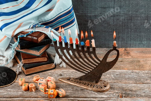Preview: Closeup of a burning Chanukah candlestick with candles Menorah a traditional Jewish holiday