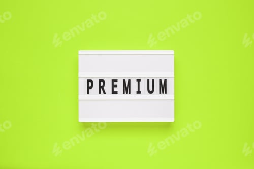 Preview: The word premium on lightbox isolated green background. Premium Membership Concept.