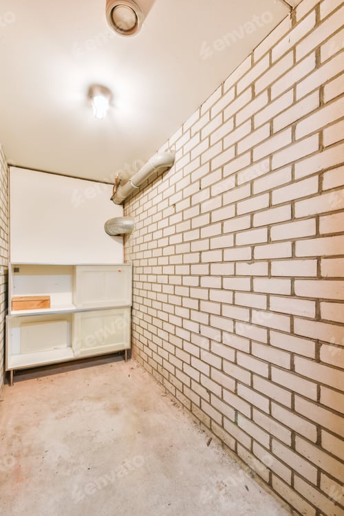 Preview: Empty Room with Brick Wall and Storage Cabinet