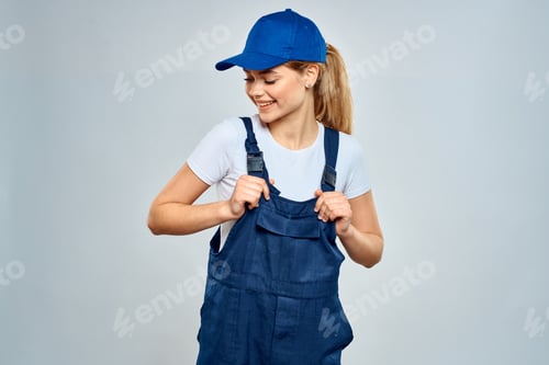 Preview: Woman in working uniform blue cap service lifestyle service