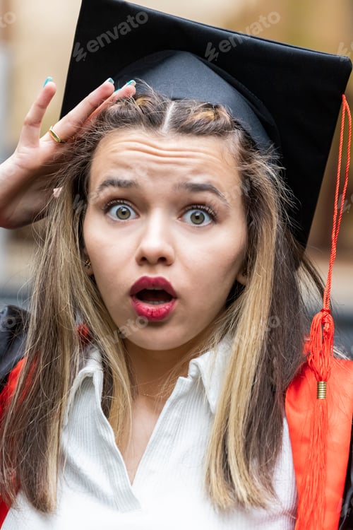 Preview: Close-up photo of shocked young student looking at the camera