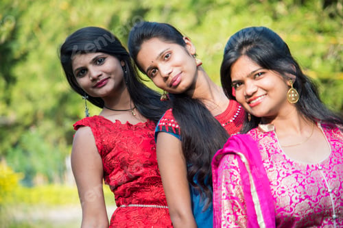 Preview: Happy Indian young girls smiling and having fun at outdoor.