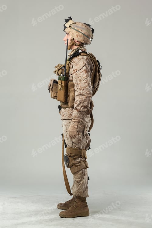Preview: Detailed view of soldier in camouflage uniform with communication gear