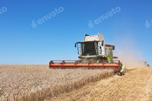 Preview: A modern combine harvester working a wheat field