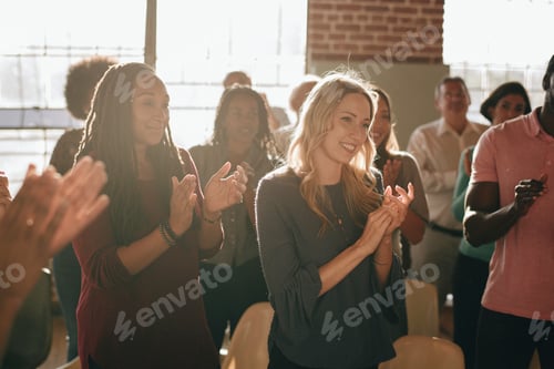 Preview: Diverse people clapping after a session