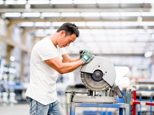 Preview: Asian worker in production plant on the factory floor