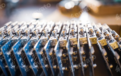 Preview: Close-up blurry metal sockets on a computer video board