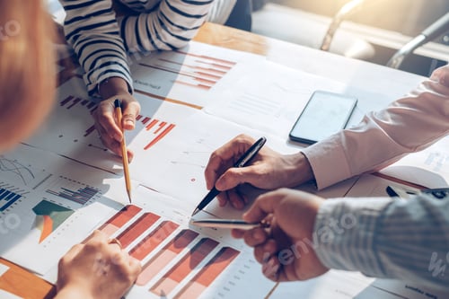 Preview: Business people discussion and summary financial information at meeting.
