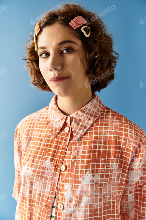 Preview: Young woman showcases vibrant summer fashion with curly hair on colorful backdrop