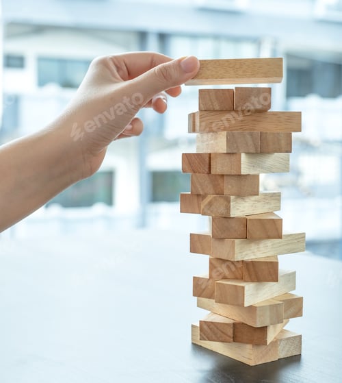 Preview: Hand holding blocks wood game