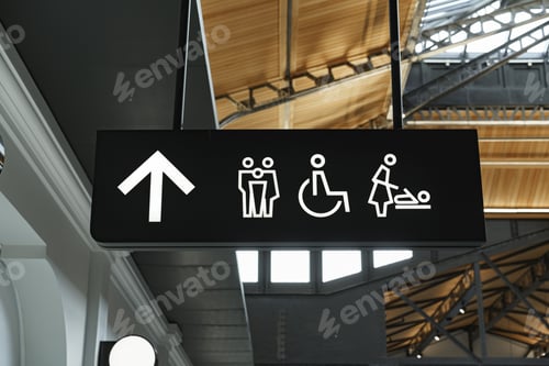 Preview: Modern public toilet sign on the wall